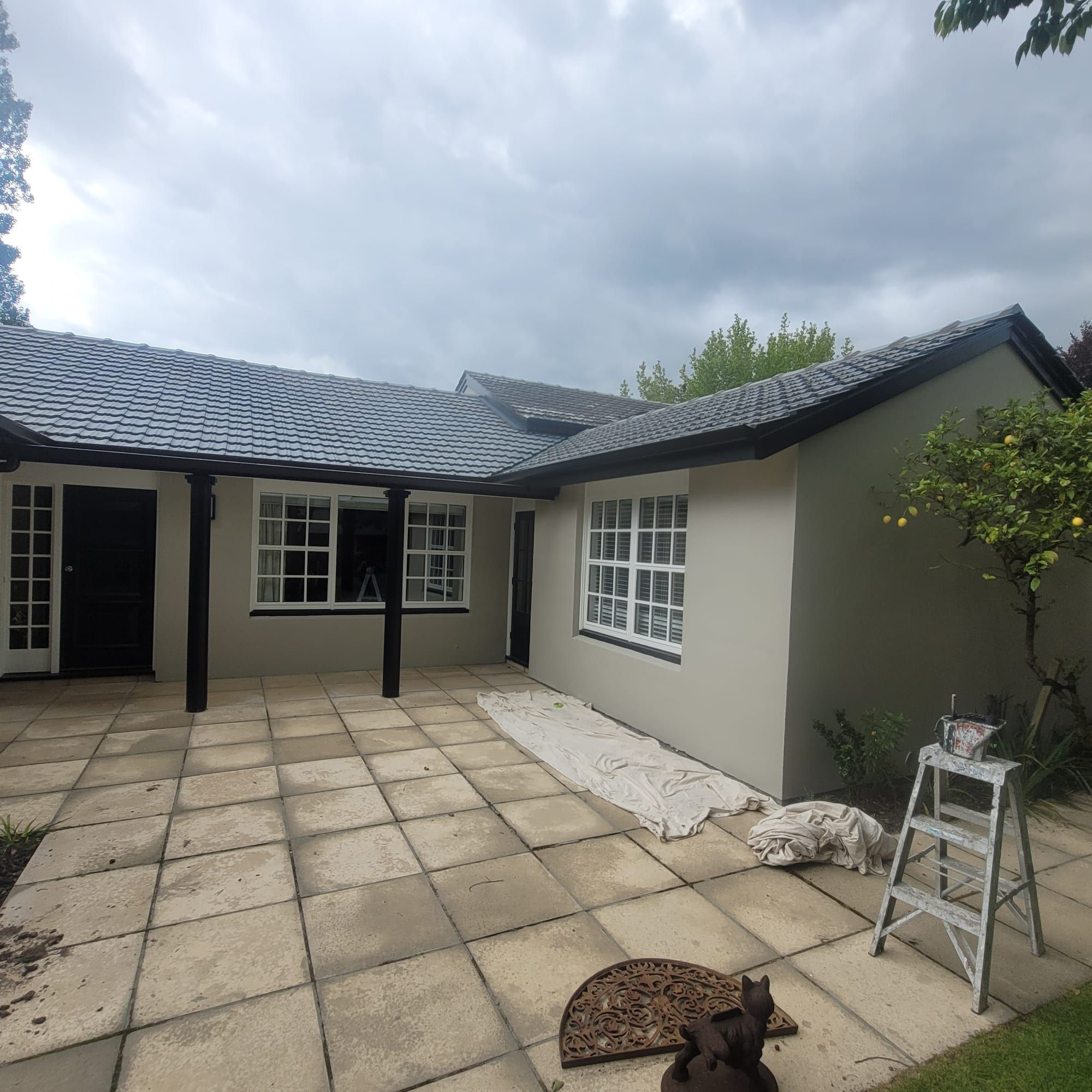 Repainted Christchurch home with a grey exterior