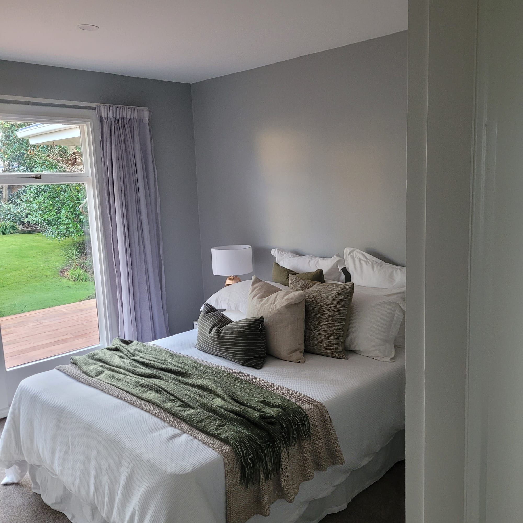 Bedroom repainted in soft neutral tones