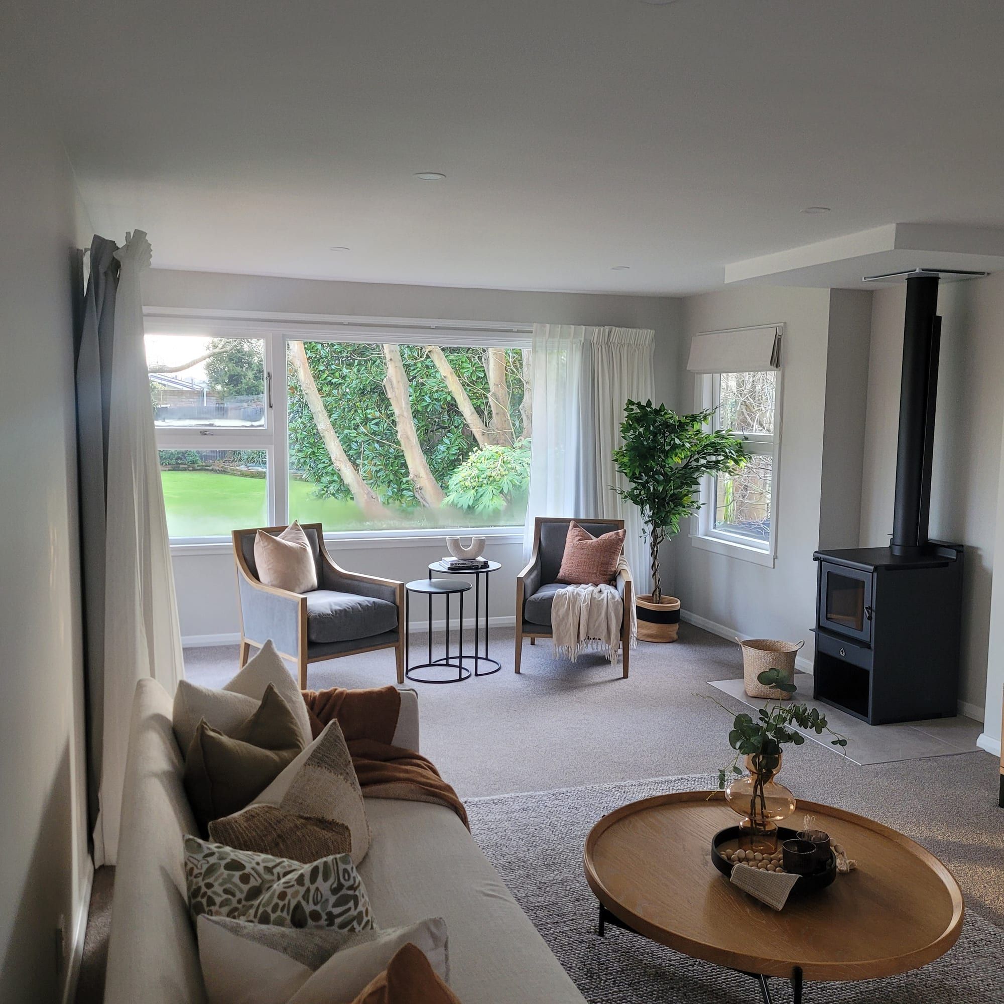 Repainted lounge styled for sale with a fireplace